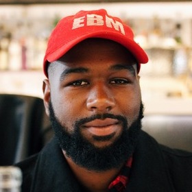 A freelance photographer seeing the world through his lens
